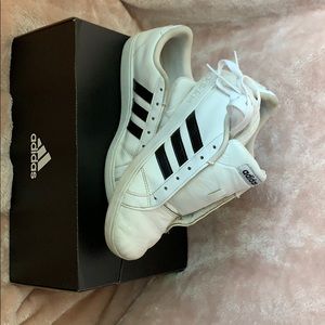 Black and white Adidas shoes